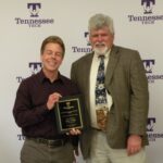 Adam Holley Receives Arts & Sciences Award for Research and Scholarly Activity