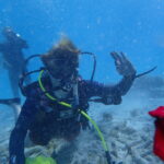 Dr. Carla Hurt Travels to Curacao to Assist in Filming a Documentary