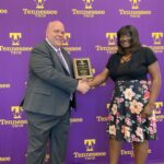 Monic Ductan receives College of Arts and Sciences Award