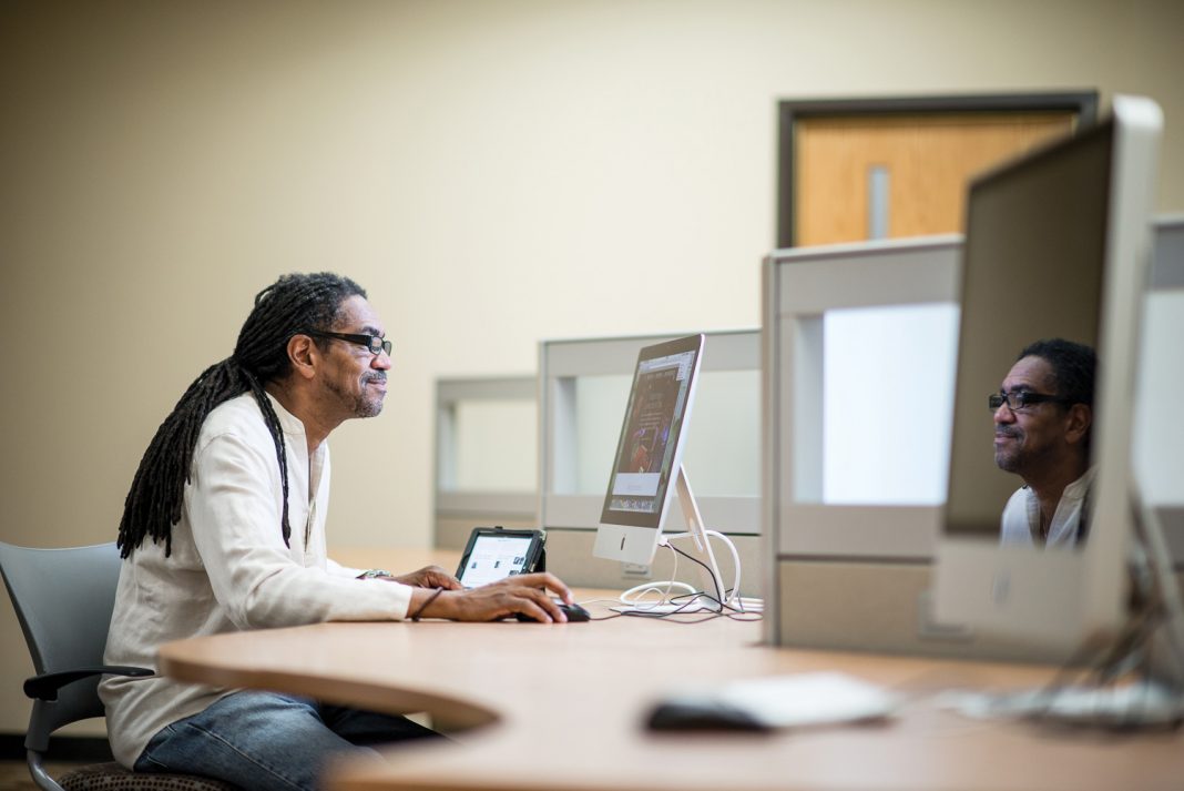 Carl Owens in a computer teaching lab